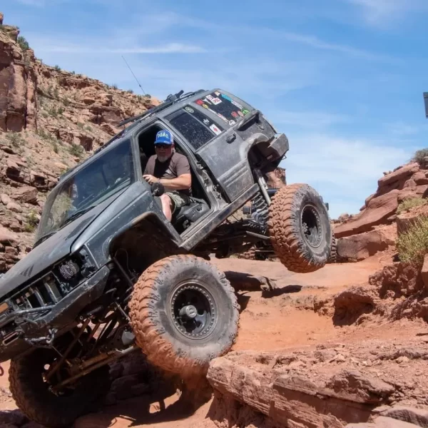 jeep going down over rocks